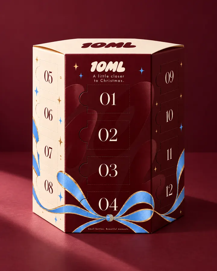 The 10ML perfume advent calendar for her: a hexagonal box with 24 numbered doors, tied with a ribbon
